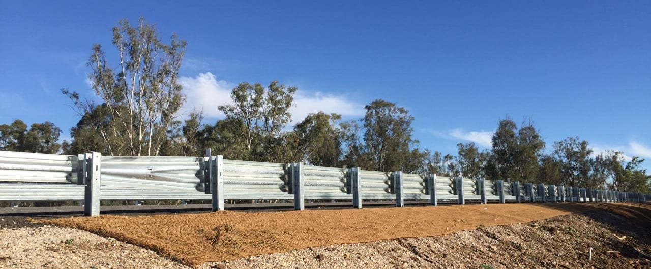 Thriebeam Guardrail roadside barrier protection with thrie beam guardrail