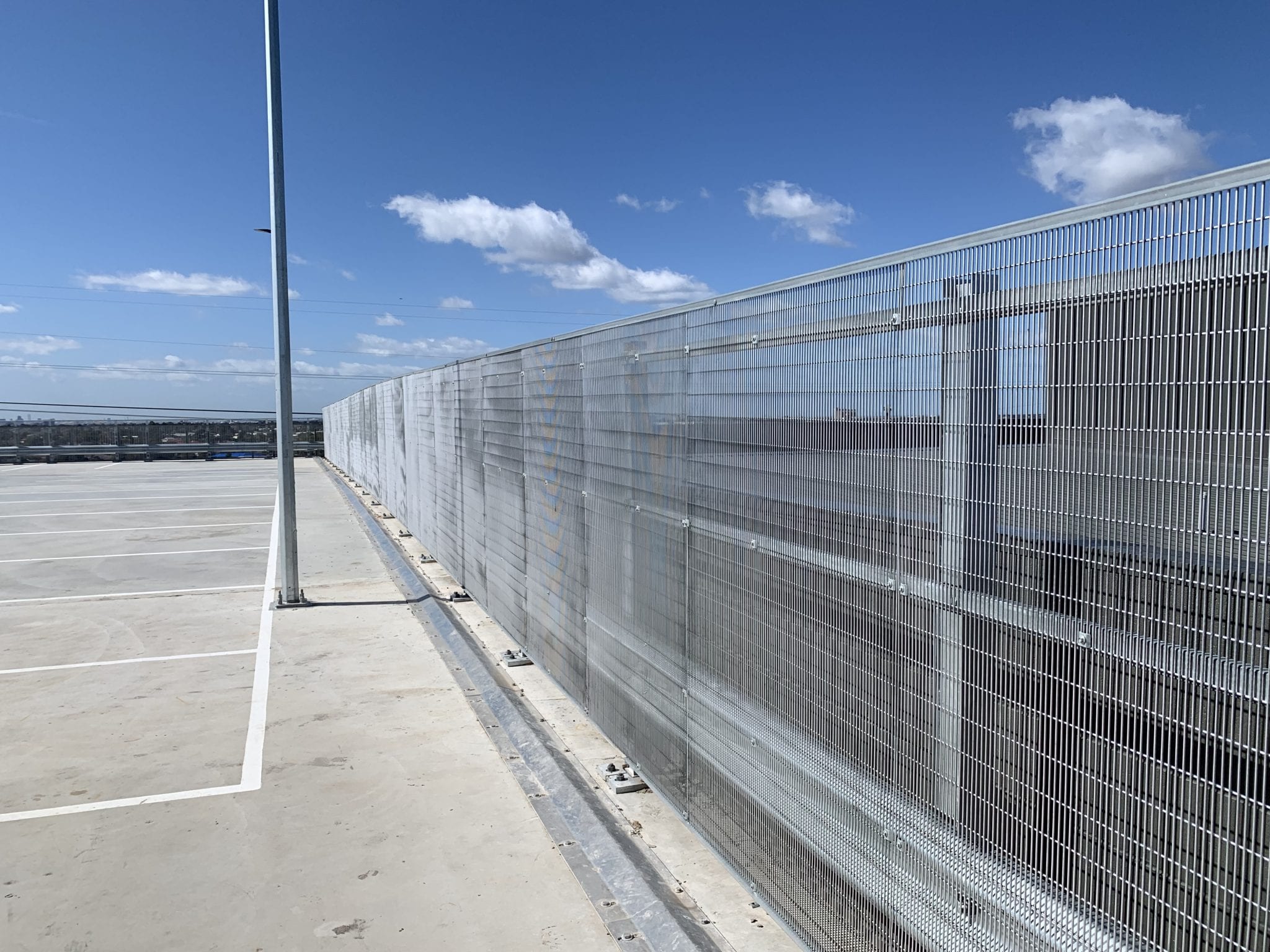 RHINO-STOP® Screen Guardrail rhino stop screen installation on the upper deck car park building