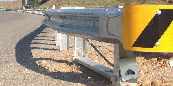 departure terminal on the trailing end of a guardrail system
