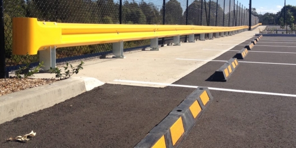 wheel stop mounted to asphalt