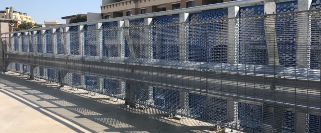 rhino stop sky edge with mesh infill and handrail installed at st george hospital car park