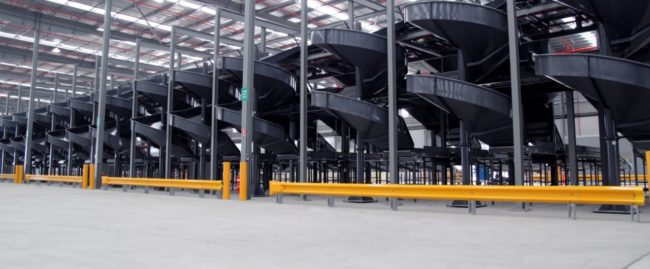 conveyor system protection with rhino stop barrier at toll warehouse